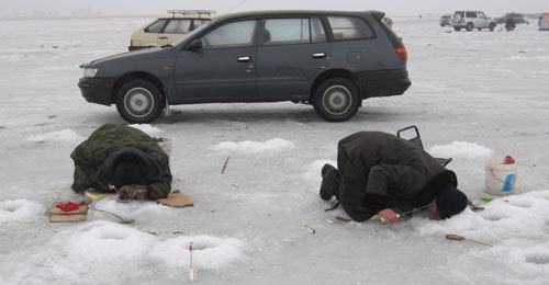 Молебен над лунками